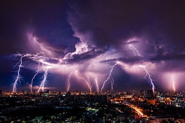 Lightning in the stormy sky - power strips with surge protection - Extension leads with surge protection
